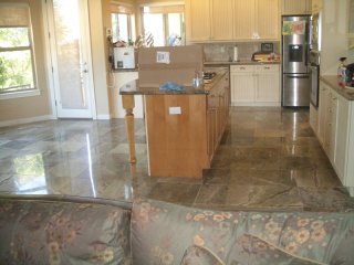 Rainforest green kitchen floor tile installation with in-floor heat