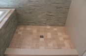 Glass and marble with porcelain master bathroom in Windsor