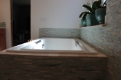 Glass and marble with porcelain master bathroom in Windsor
