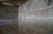 Granite countertops with travertine backsplash