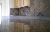 aPorcelain backsplash with granite inserts and countertops
