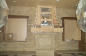 Travertine subway backsplash with granite countertops