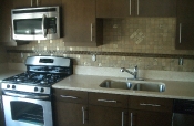 Porcelain mosaic backsplash with glass inserts