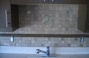 Porcelain mosaic backsplash with glass inserts