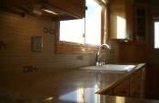 Porcelain mosaic backsplash with glass inserts