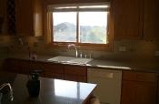 Porcelain mosaic backsplash with glass inserts