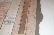 Schluter in-line linear drain in master bathroom shower
