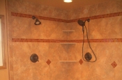 Porcelain master bathroom with glass inserts in Fort Collins