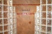 Double curved glass block walls in master bathroom