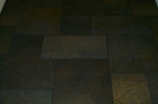 Porcelain slate basketweave tile floor