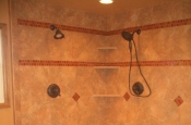 Porcelain and glass master bathroom shower tile with glass block wall installation in Fort Collins, Colorado