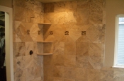 Travertine and glass master bathroom shower tile installation in Windsor, Colorado