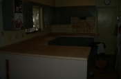 Kitchen Granite Tile Countertop and Glass Backsplash edging