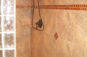 Taconic slate master bathroom shower with glass mosaics curb