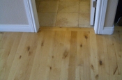 Wood and bathroom ceramic floor before marble installation