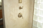Master bathroom marble and glass block shower in Fort Collins, Colorado