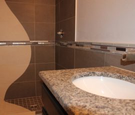 Custom porcelain, glass, metal shower