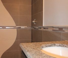 Custom metal, glass, marble mosaic liner