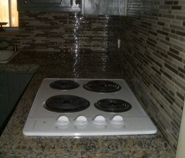 Kitchen Granite Tile Countertop and Glass Backsplash end 2