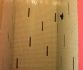 Shower with glass mosaics in Fort Collins